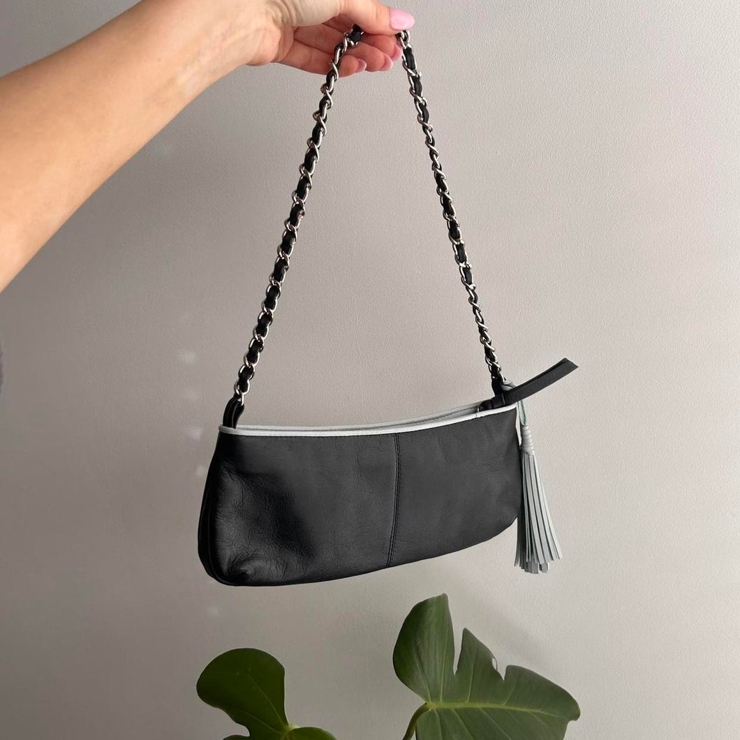 Black leather mini bag with tassel detail