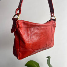 Load image into Gallery viewer, Orange leather bag with tassel detail
