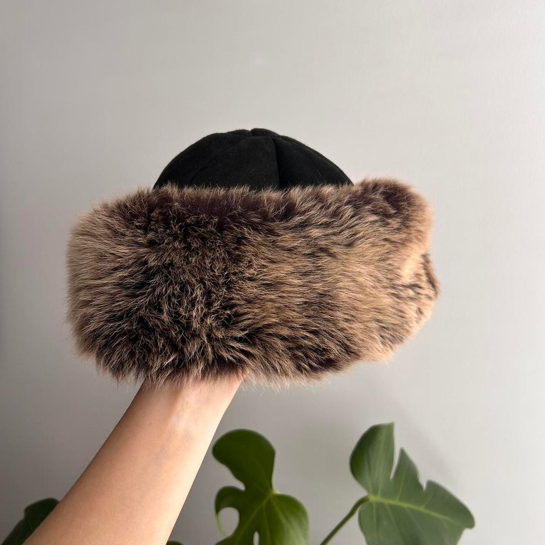 Black cosy hat with brown faux fur trim