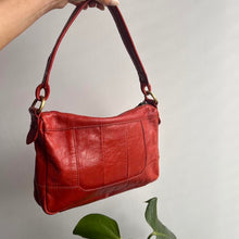 Load image into Gallery viewer, Orange leather bag with tassel detail
