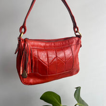 Load image into Gallery viewer, Orange leather bag with tassel detail
